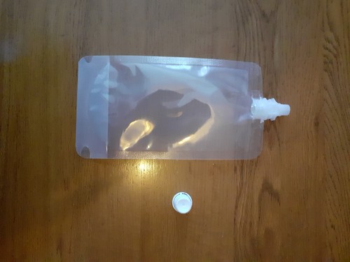 Clear plastic spouted liquid - plastic,